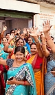 Participants of the Shubh Mint program smile and wave in a joyful group photo.
